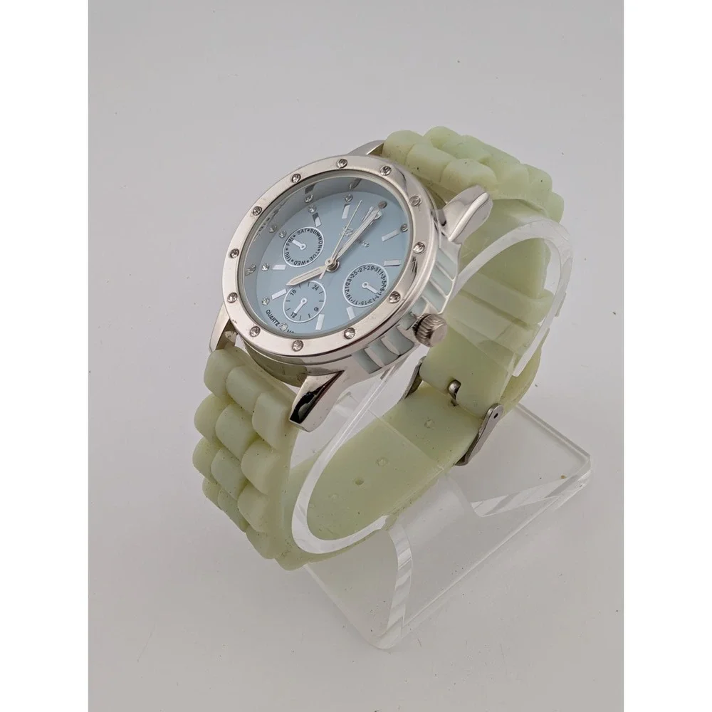 Geneva Watch Women 36mm Silver Case Light Green Silicone Band- New Battery